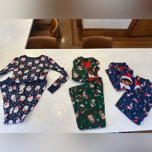 3 pairs of gender neutral Christmas pajamas (8/10)
